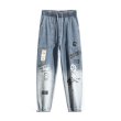 画像2: Men's men and women hip-hop straight wide-leg pants graffiti cartoon trend gradient loose-fitting harem pants ユニセックスパンツ男女兼用レター＆コミックプリントデニムパンツ (2)